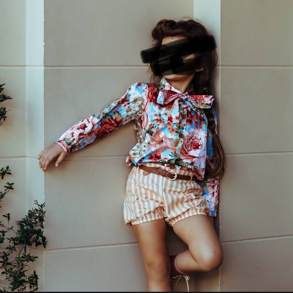 Girl outfit size 8. Bow tie floral top. Striped bloomer shorts. Floral shorts